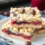 Delicious gluten-free cranberry crumble bars with buttery crust and topping.